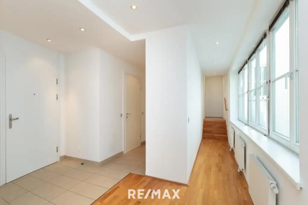 Altbau trifft Moderne – Wohnen über den Dächern