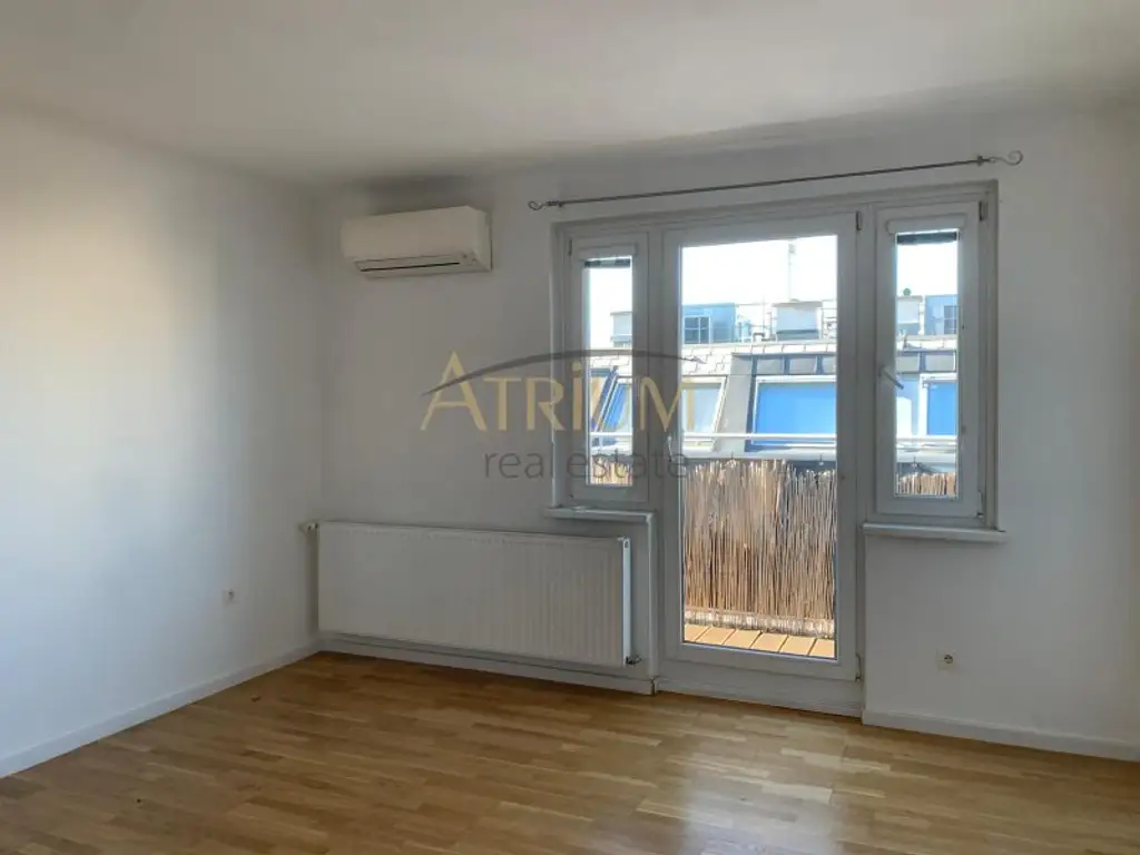 Lichtdurchflutete 2-Zimmer-Dachgeschosswohnung mit 40 m² Terrasse in ruhiger Lage