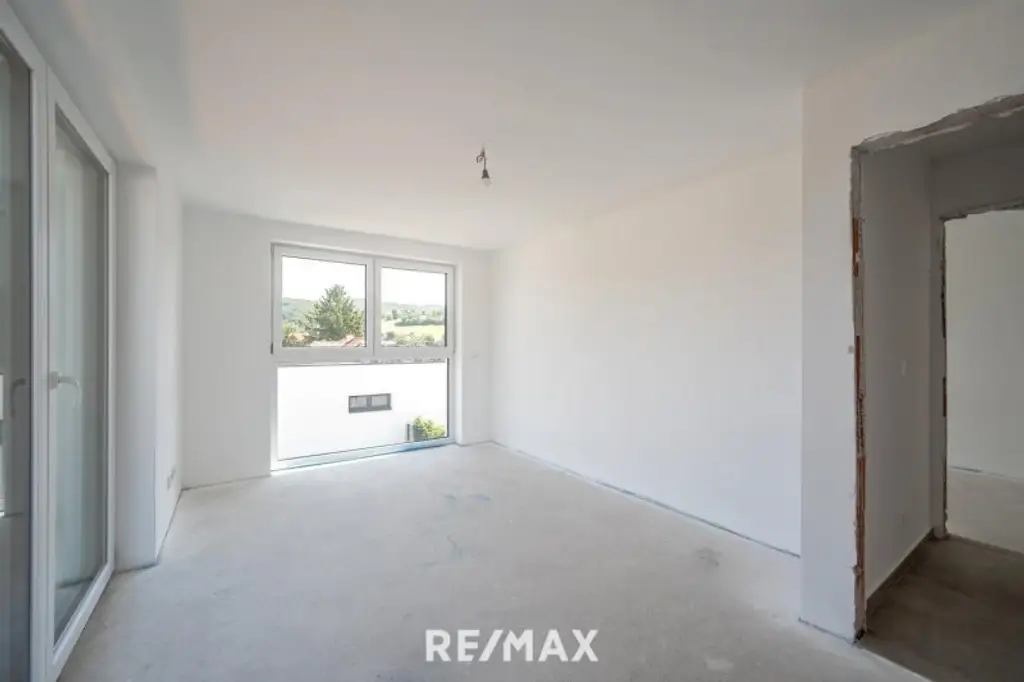 Erstbezug: Großzügiger Familientraum mit unverbaubarem Grünblick!