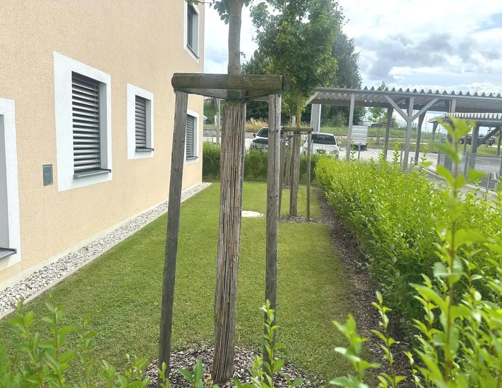 Vermietete Anlegerwohnung mit Garten - moderne Wohnqualität in ruhiger Lage
