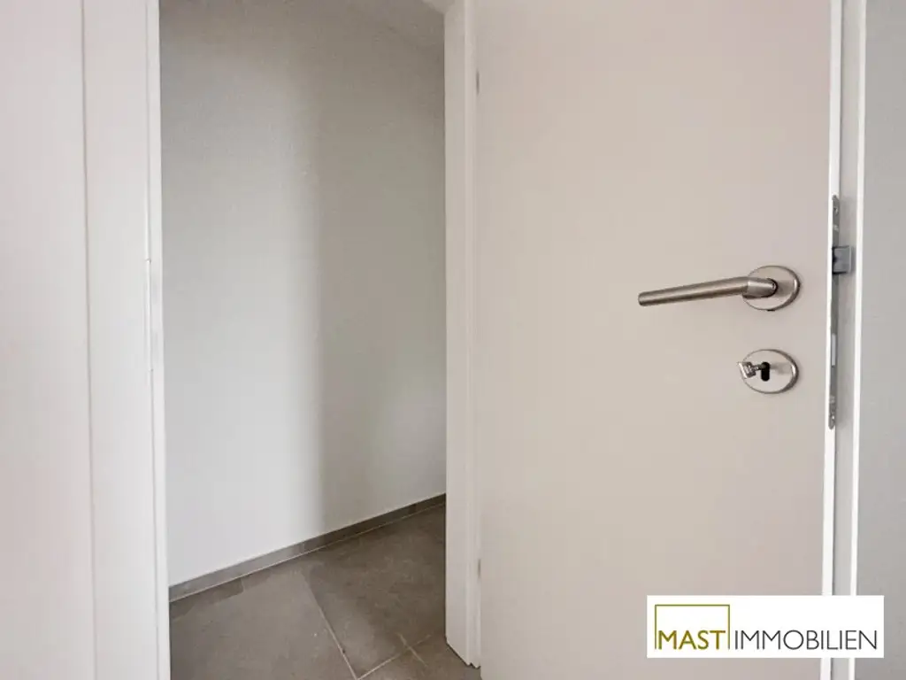 Ab sofort! Lichtdurchflutete 2-Zimmer-Neubauwohnung mit 8m² Terrasse