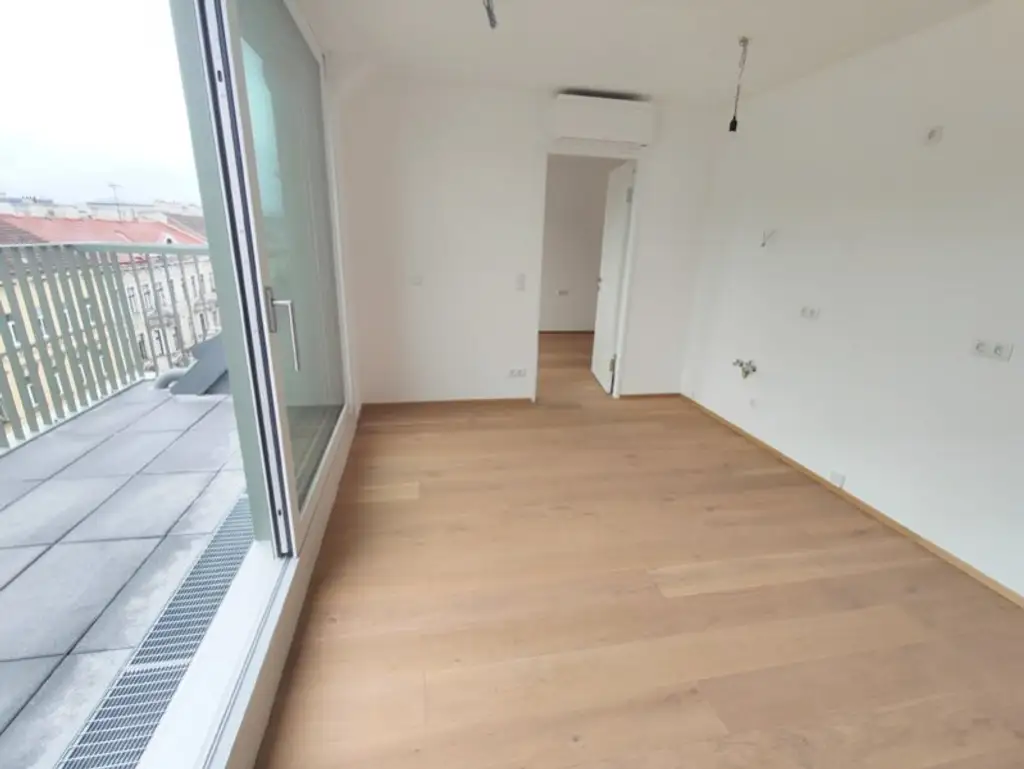 Modern wohnen in Meidling! DG-2-Zimmer-Erstbezug mit Sonnenterrasse - Top70