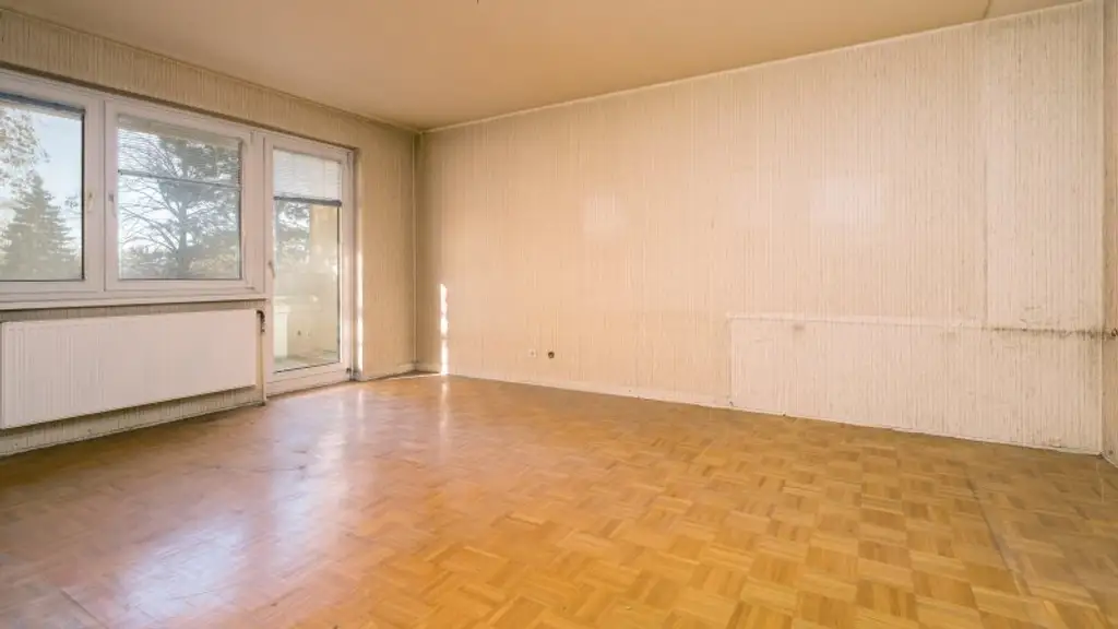 Renovierungsbedürftige 3-Zimmer-Wohnung mit Loggia in Leopoldsdorf – Ihr neues Zuhause!