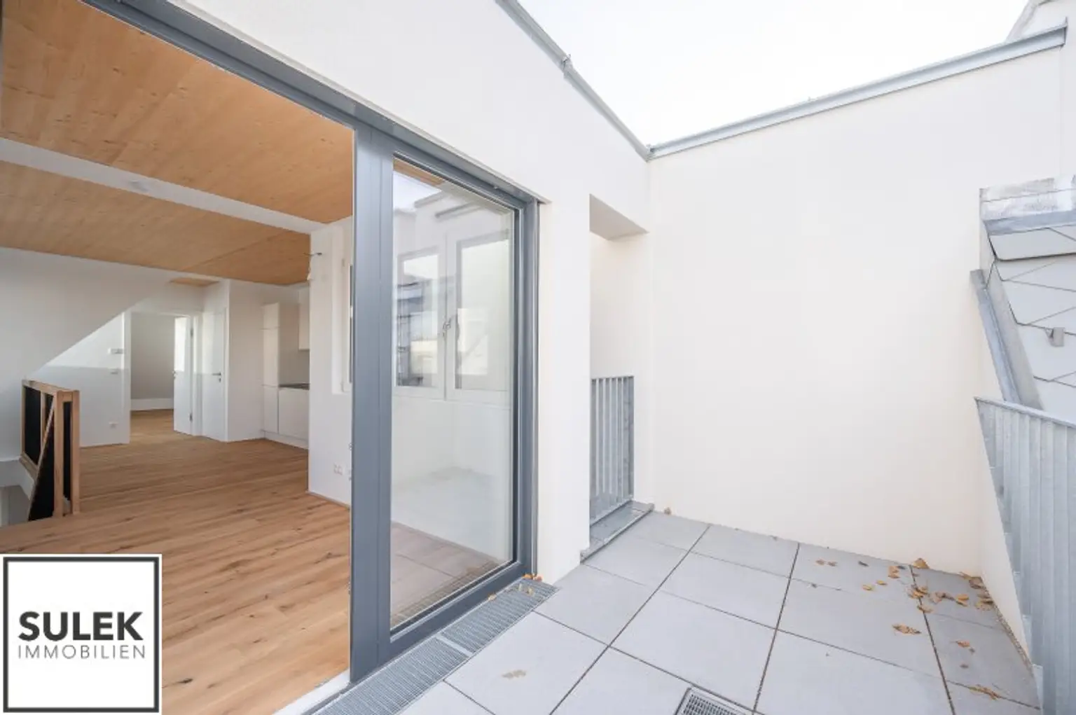 Erstbezug: 3-Zimmer-Maisonette mit hofseitiger Terrasse