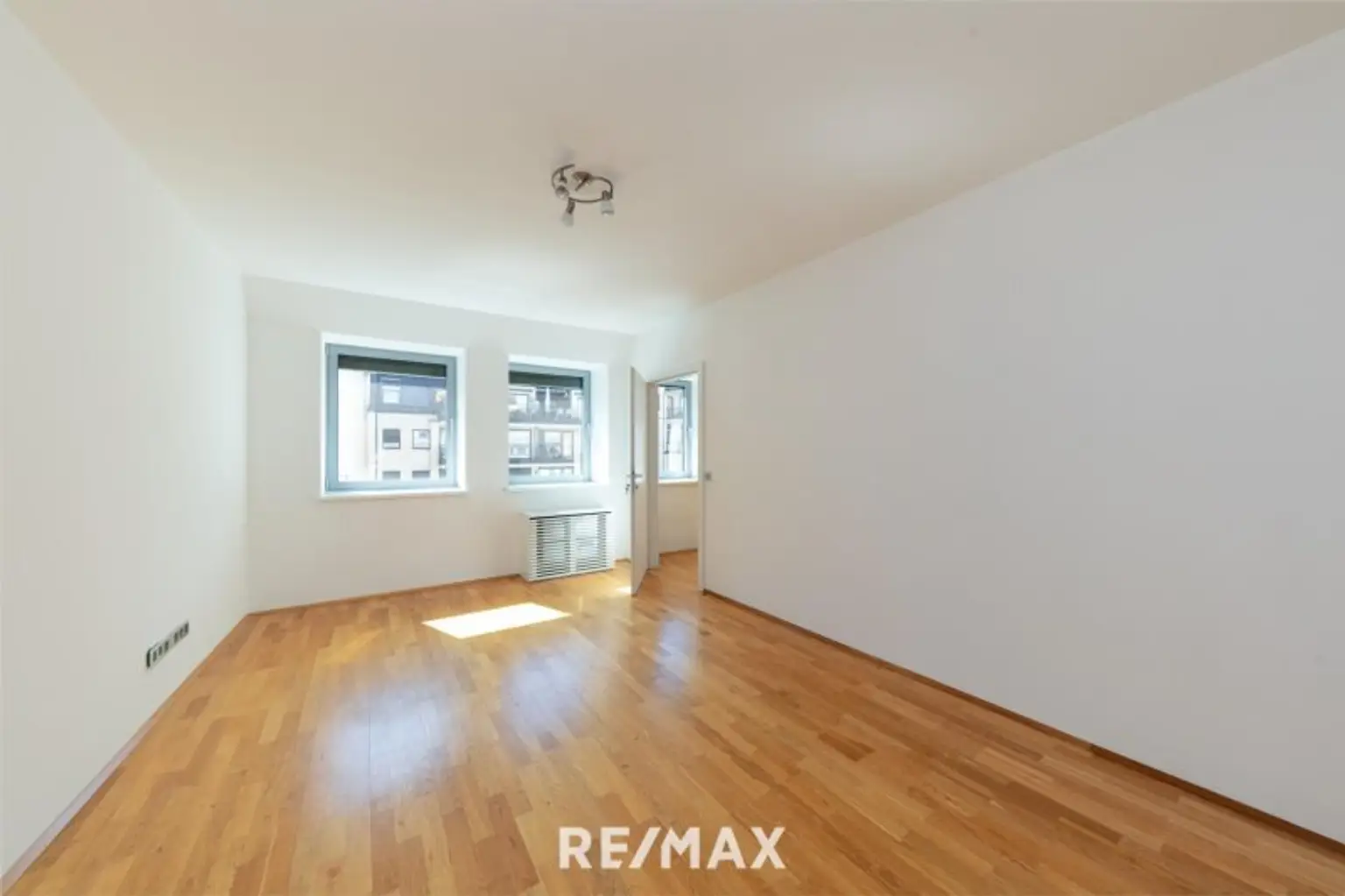 Altbau trifft Moderne – Wohnen über den Dächern