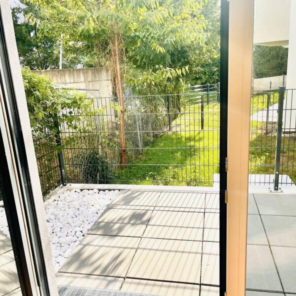 Exklusive 3-Zimmer-Terrassenwohnung mit eigenem Gartenanteil