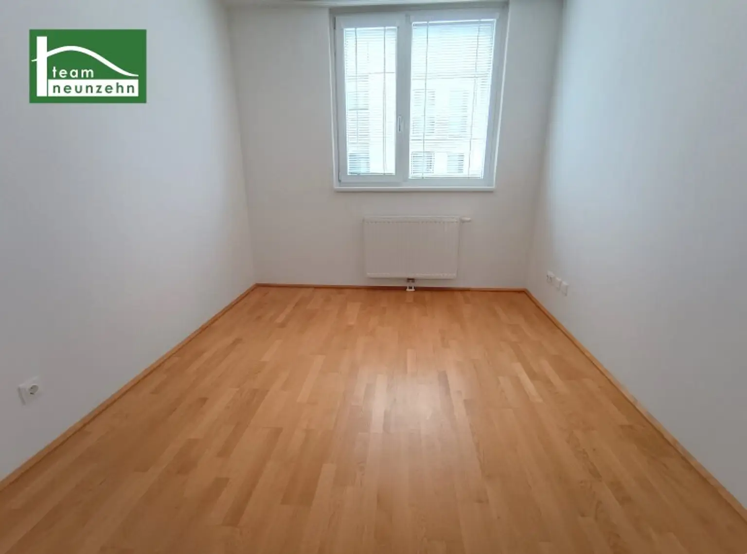 Grünblick mitten in der Stadt: 2-Zimmer-Neubauwohnung in Hofruhelage