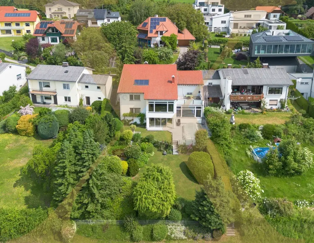 Exklusives Einfamilienhaus in Altenberg (Oberbairing) bei Linz mit Einliegerwohnung, Pool und Wintergarten!