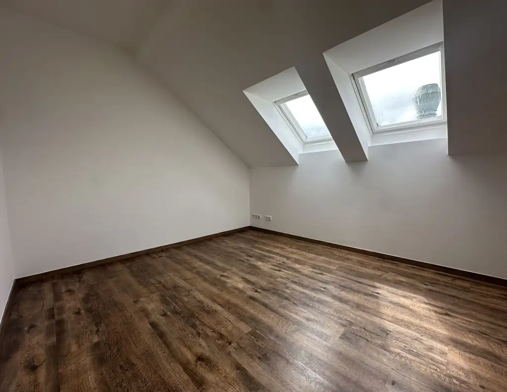 Dachgeschoss trifft Design - wohnen im Herzen von Pettenbach.