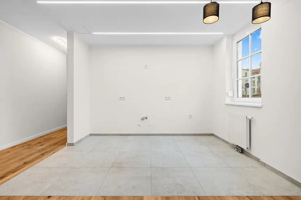 "Helle, Top-renovierte Eigentumswohnung mit Balkon & Garagenplatz – ruhig wohnen, zentral leben"