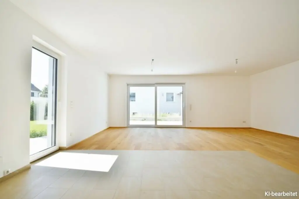 Erstbezug - Exklusive Doppelhaushälfte mit Garten und Terrassen in Traumlage