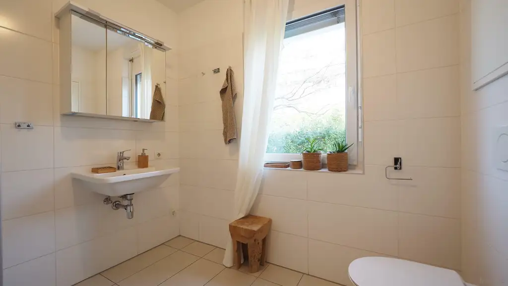 Moderne 2 Zimmer Wohnung mit Garten und 2 Tiefgaragenplätzen in Graz - St. Peter und ruhiger Lage!