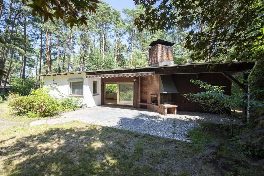 Ein besonderer Rückzugsort im Grünen – Winkelbungalow mit großem Waldgrundstück in Ashausen-Bülhorn