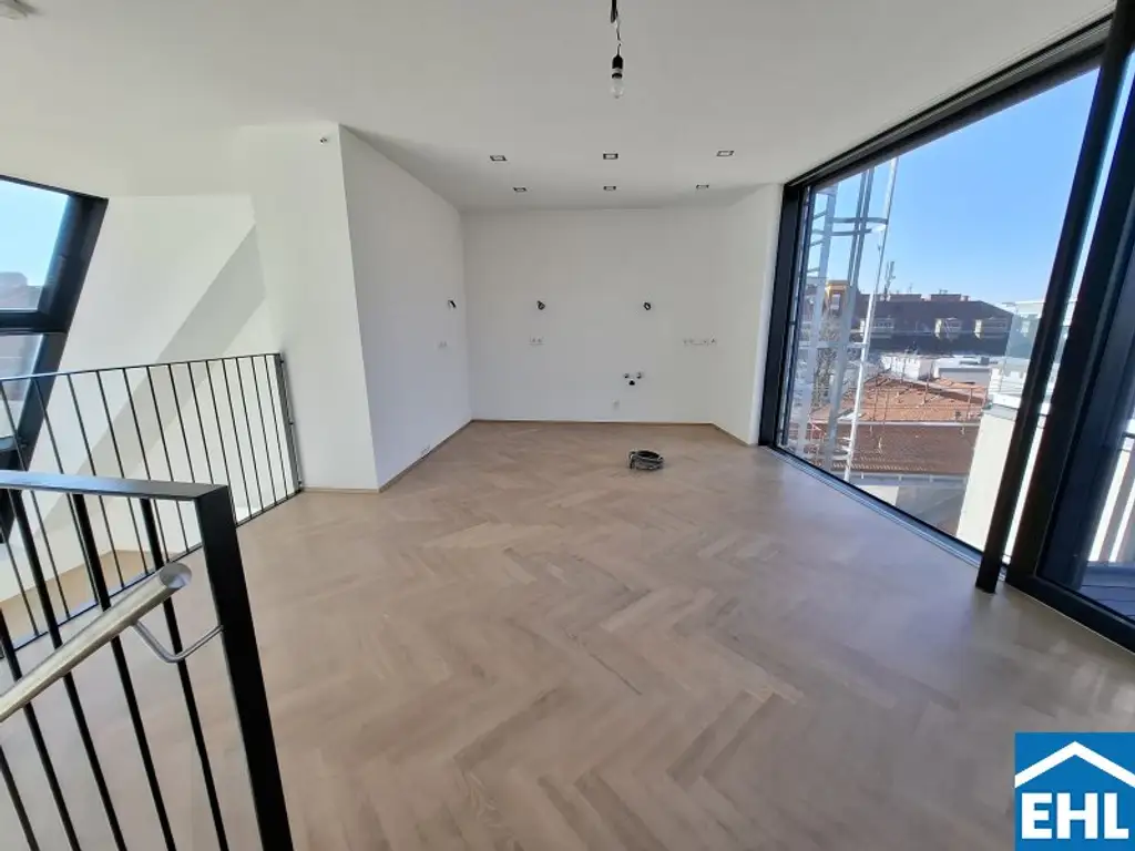 Spektakuläre Dachgeschoßmaisonette mit Terrassentraum und Blick auf die Canisiuskirche