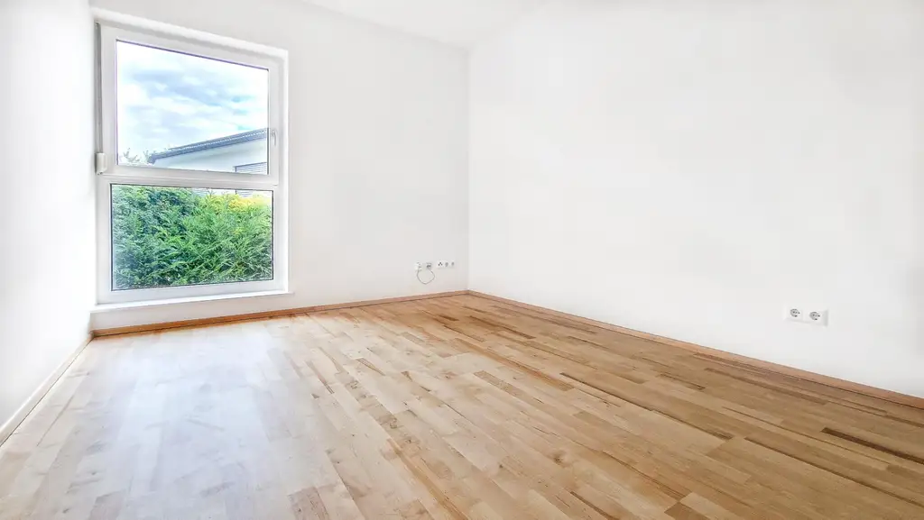 Niedrigenergie-Doppelhaushälfte in Mauer. 5 Zimmer, Terrasse, Garten und Autostellplatz