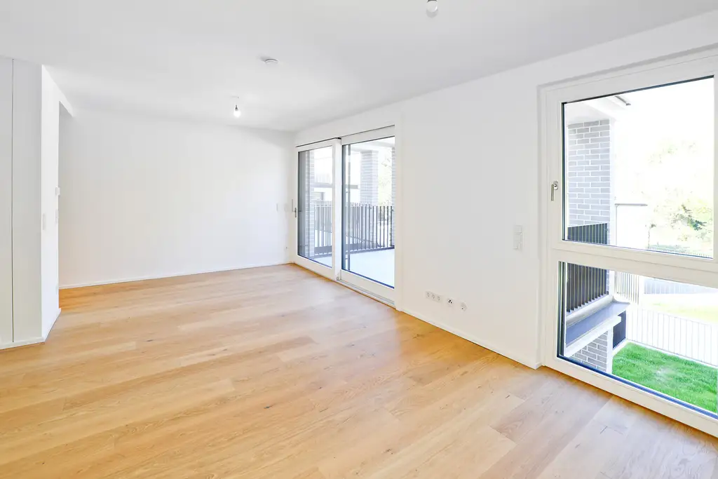 WOLKE SIEBEN: Charmante 2-Zimmer Gartenwohnung mit Terrasse