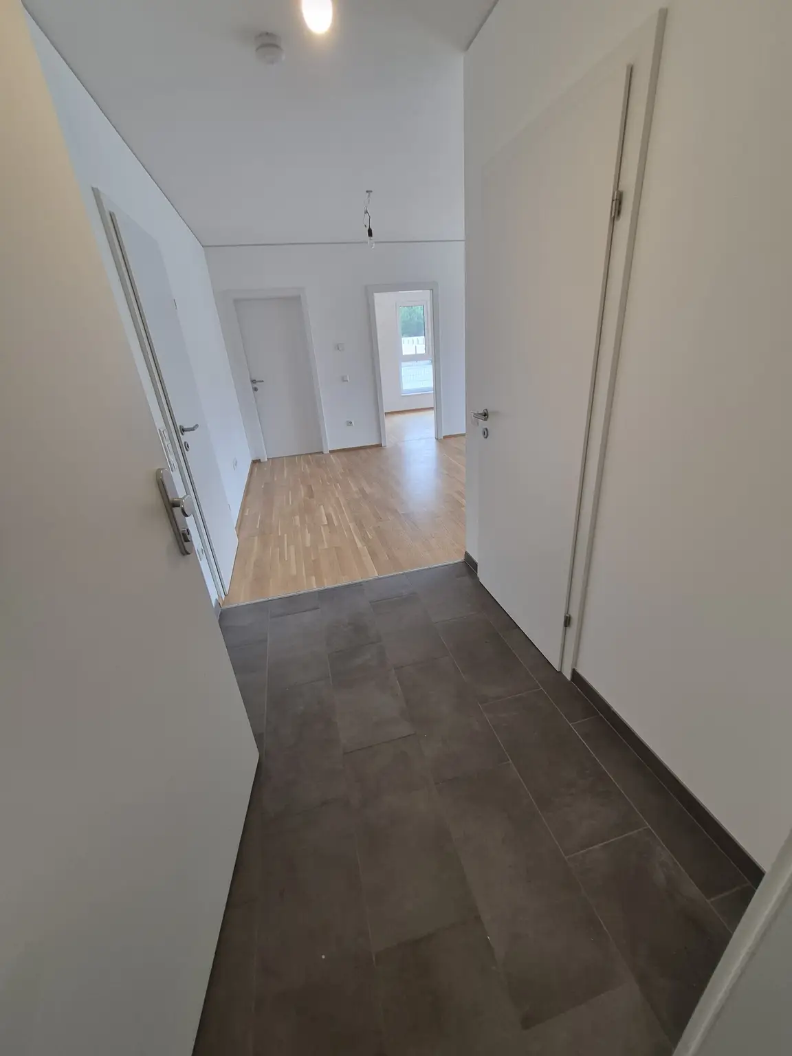 Neubau: Tolle ca. 65 m² Wohnung mit ca. 64 m² Eigengarten und Terrasse