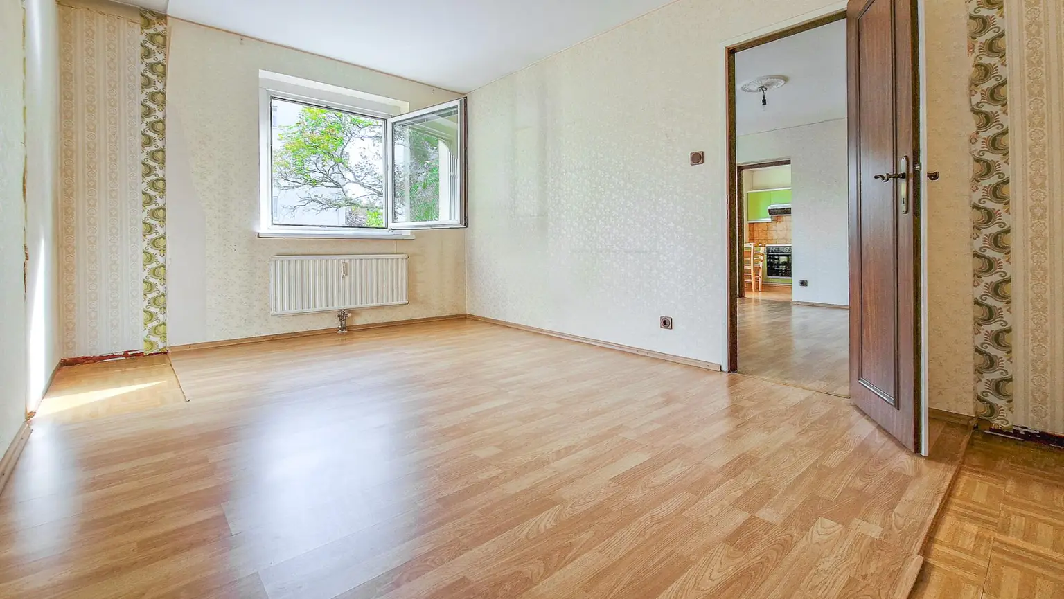 Helle Eigentumswohnung mit Grünblick im 3. Liftstock eines thermisch sanierten Hauses