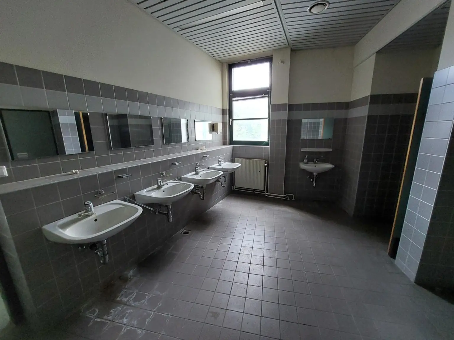 Waschraum u. WC Herren 1.OG