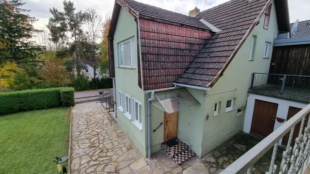 Vielseitiges Mehrfamilienhaus mit Charme und einladendem Garten