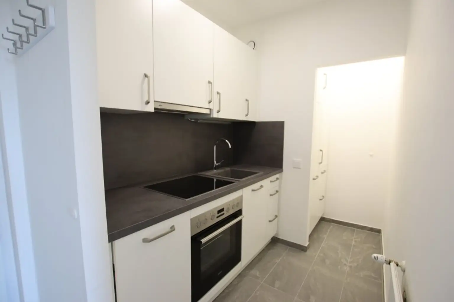 Kernsanierte und schöne 2 Zi Wohnung im 5. und letzten OG mit Garage in Klagenfurt - Karl-Landsteiner-Gasse