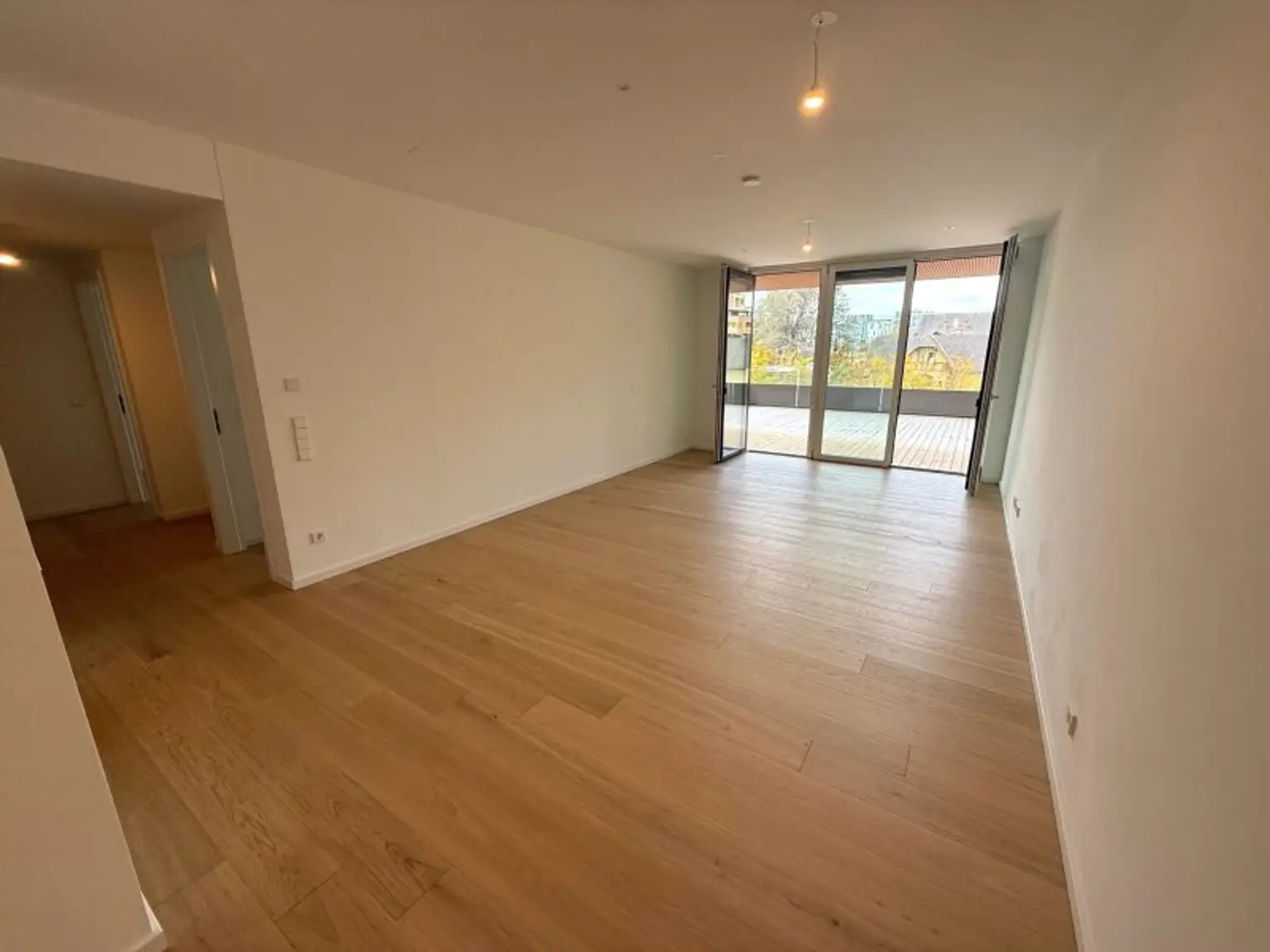 ERSTBEZUG 3 ZIMMER WOHNUNG IM "GRÜNBLICK" VIERTEL ZWEI + TRAUMTERRASSE MIT ca. 64 m² + NUTZUNG INFINITY-AUSSENPOOL, GYM & SAUNA