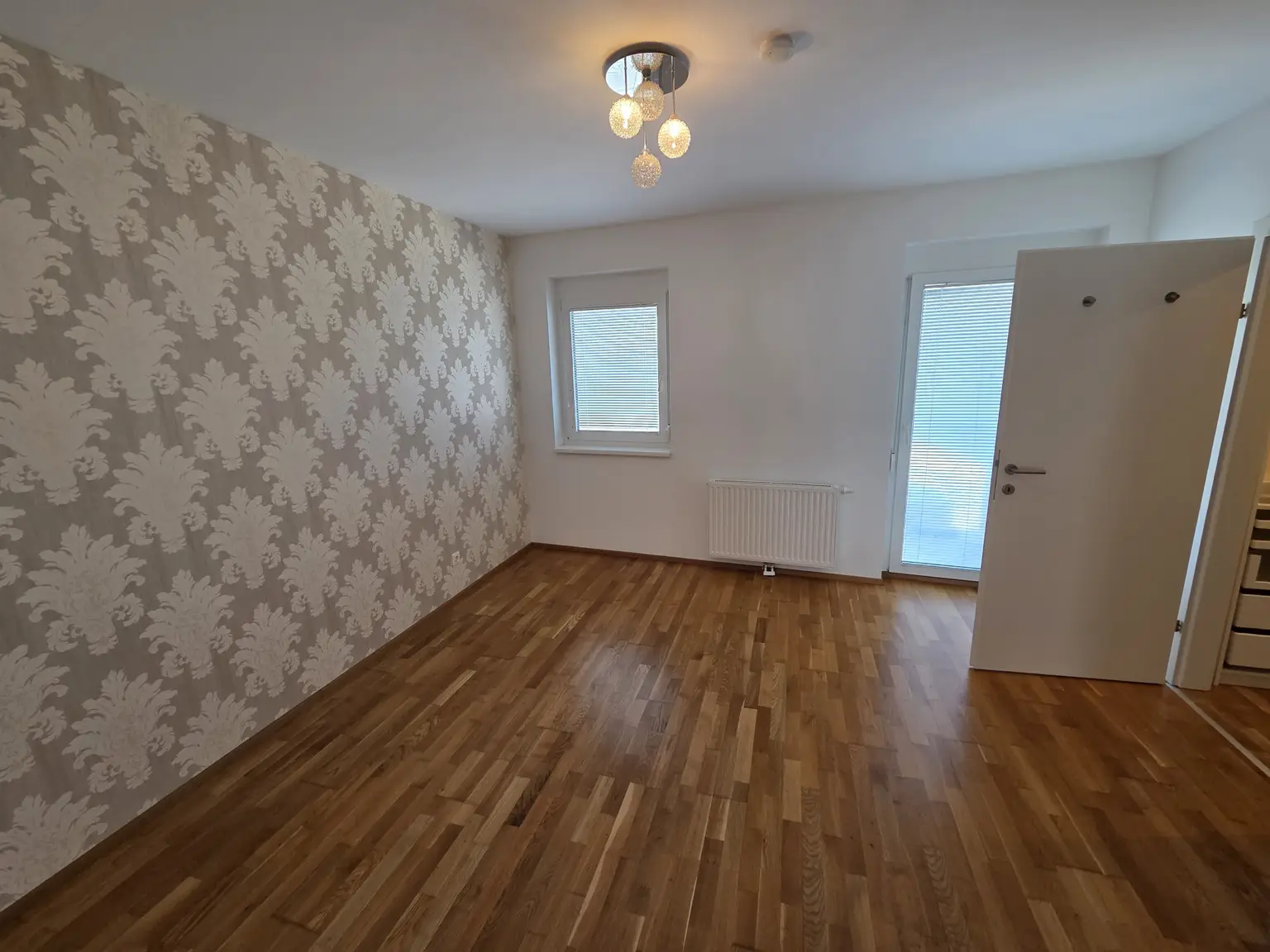 Schlafzimmer mit Balkon