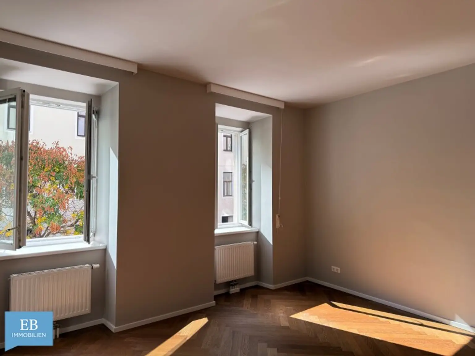Helle Familienwohnung mit feiner Farbwelt und Fitnessraum im Haus