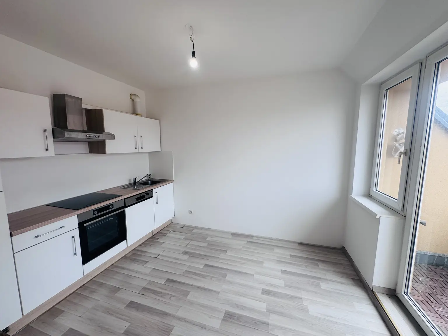 Großzügige 3-Zimmer-Maisonette mit Balkon & Garagenplatz im Dachgeschoss