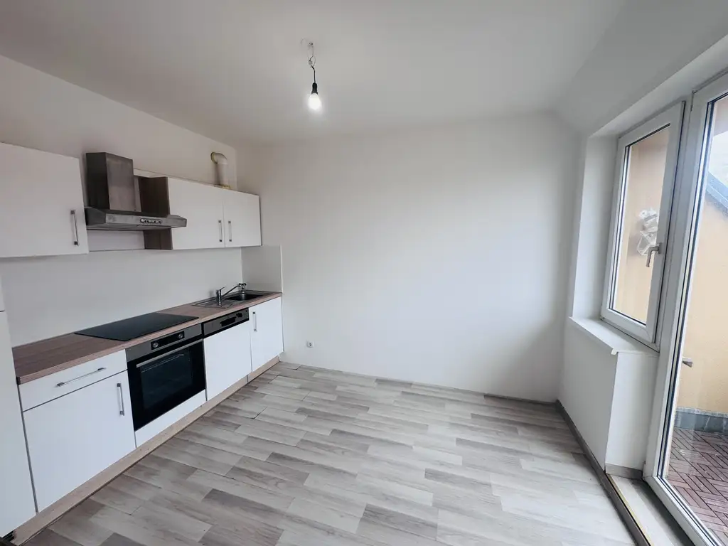 Großzügige 3-Zimmer-Maisonette mit Balkon & Garagenplatz im Dachgeschoss