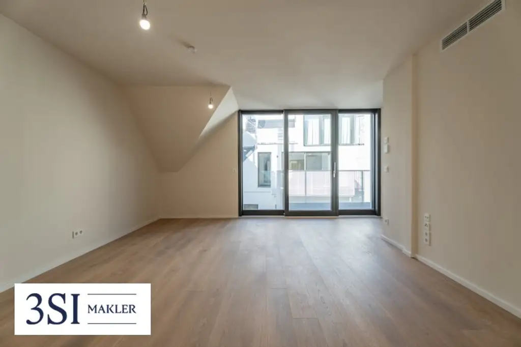 2-Zimmer-Wohnung mit Balkon über den Dächern