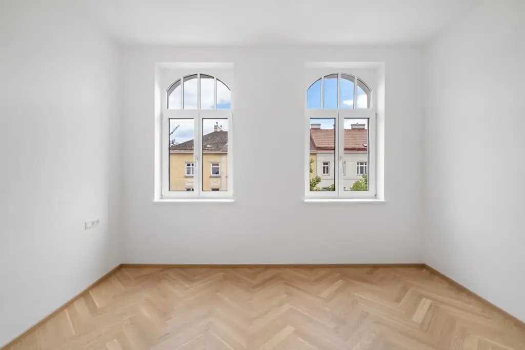 4-Zimmer-Altbaueigentumswohnung in generalsaniertem Altbau mit Balkon