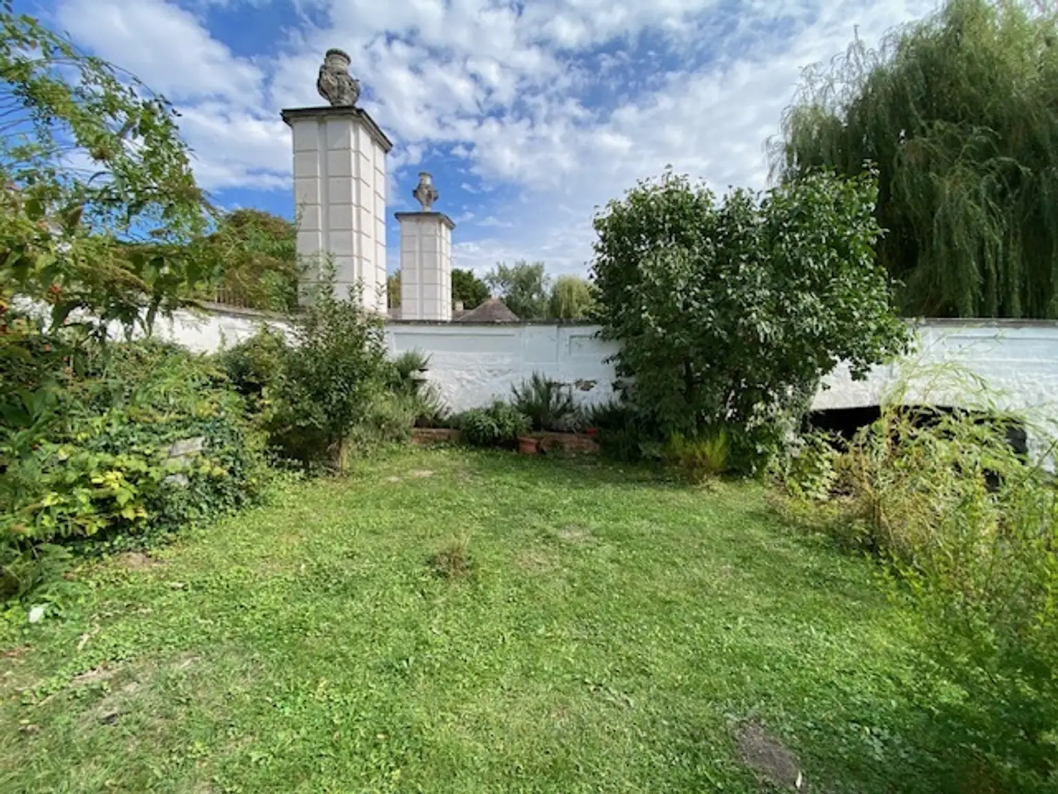 Traumhafte Gartenwohnung in Ebergassing: 140m² gepflegt mit Einbauküche und Badewanne!