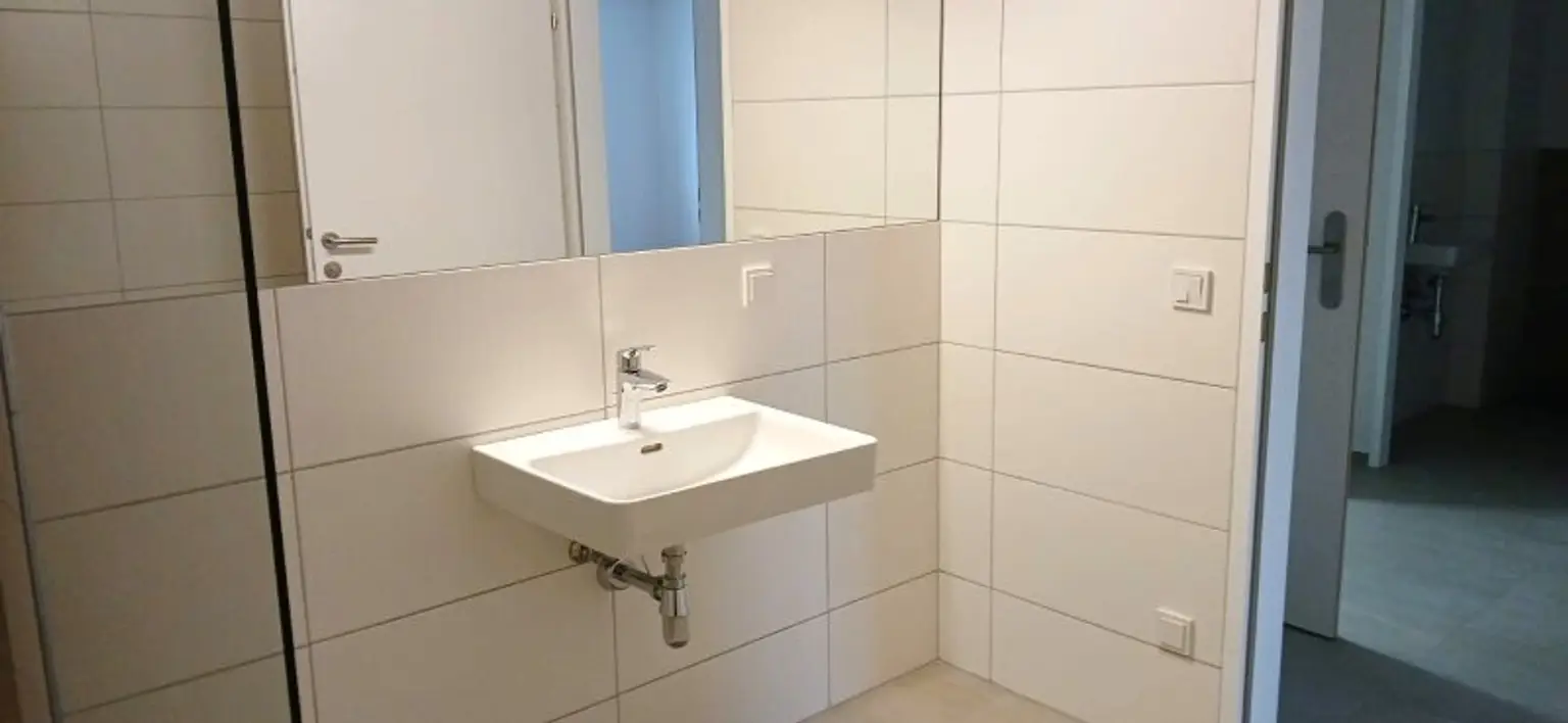 SATTLEDT NEUBAU - TOP 2.7 - ERSTBEZUG - 2 Zimmerwohnung mit eigenem Tiefgaragenplatz