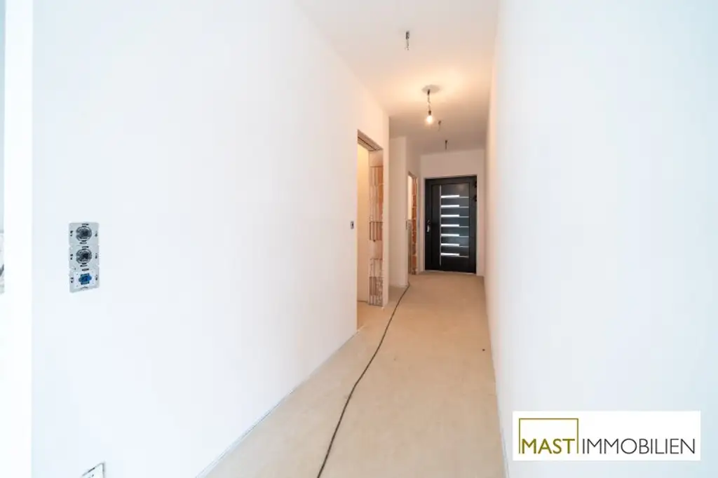 5-Zimmer Reihenhaus in Strasshof in Zentrumslage – Wohnen im Grünen bei Wien!