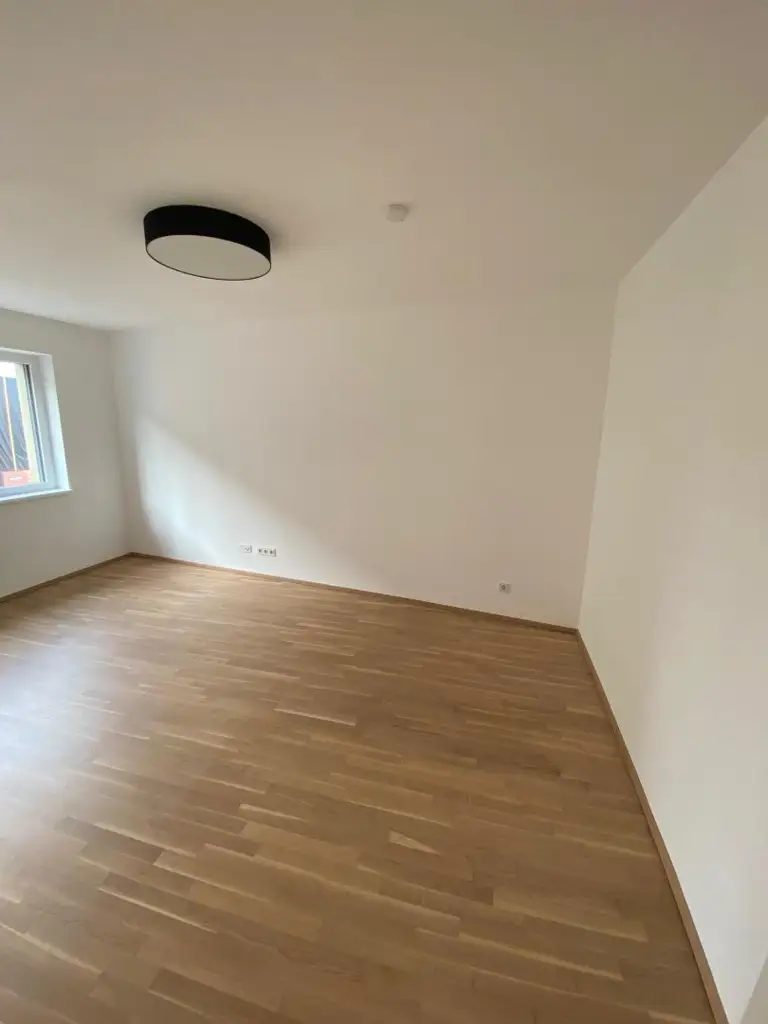 Moderne Neubauwohnung im Zentrum – mit Loggia u. Lift ! TIEFGARAGENPLATZ und KONTROLLIERTE WOHNRAUMBELÜFTUNG