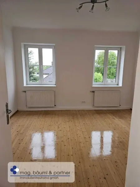 3 geräumige Zimmer, Küche mit Essplatz, Gartennutzung und PKW Stellplatz