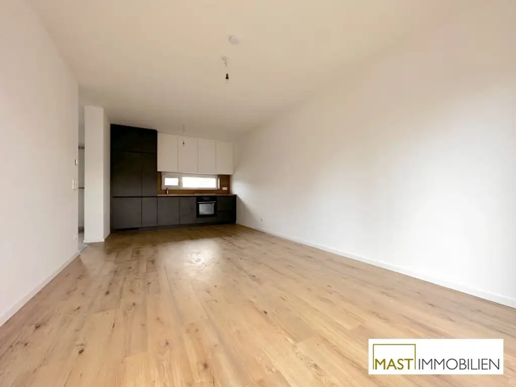 Ab sofort! Lichtdurchflutete 2-Zimmer-Neubauwohnung mit 8m² Terrasse