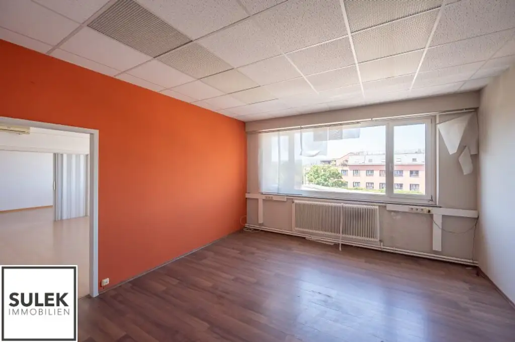 Grundstück mit vier Baukörpern - Büro-, Geschäfts- und Gewerbegebäude inkl. Parkplätzen in Vösendorf
