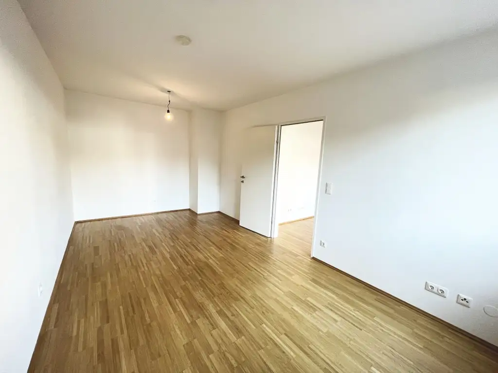 Moderne 2-Zimmer-Wohnung mit ruhiger Terrasse und Dachgarten - 
in U-Bahn-Nähe!