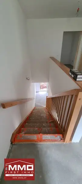 ***ERSTBEZUGS-DOPPELHAUSHÄLFTE DIREKT AM WASSER MIT SÜD-GARTEN!***