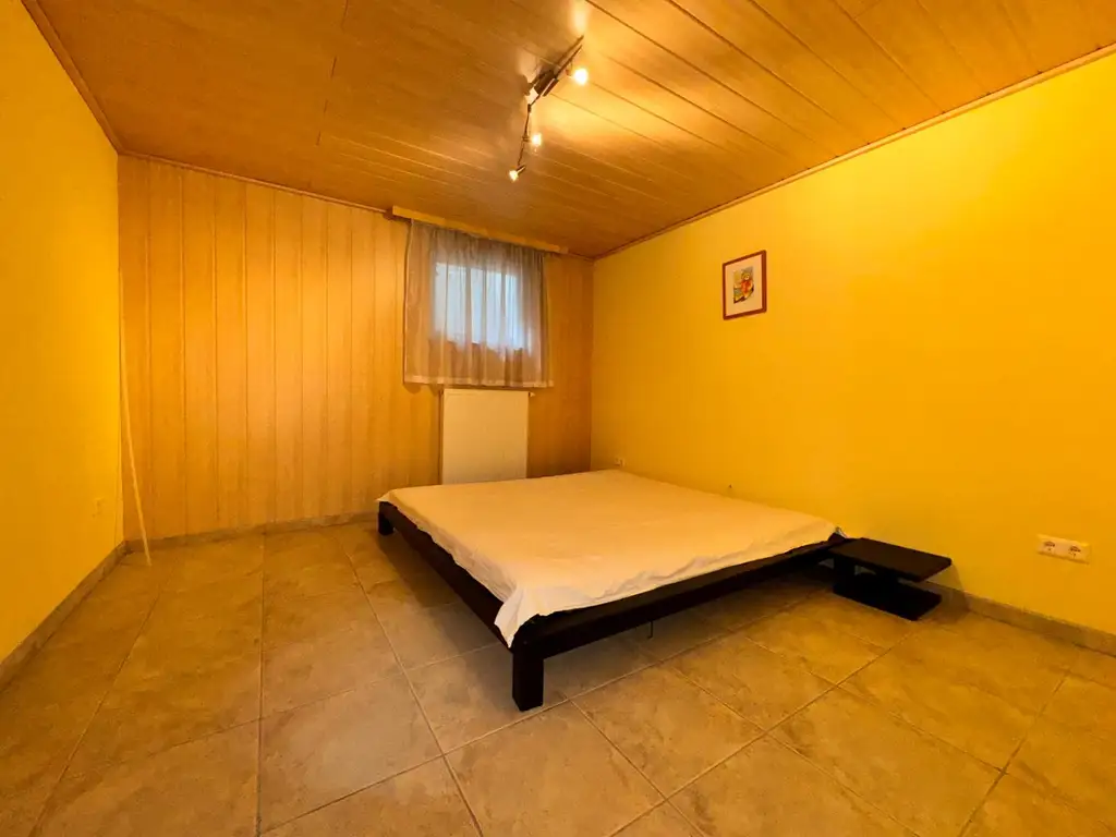 XXL Traum Bungalow mit Kachelofen überdachter Terrasse, Gartenoase, Wohnkeller und Doppelgarage  im Laahfeld /Ansfelden