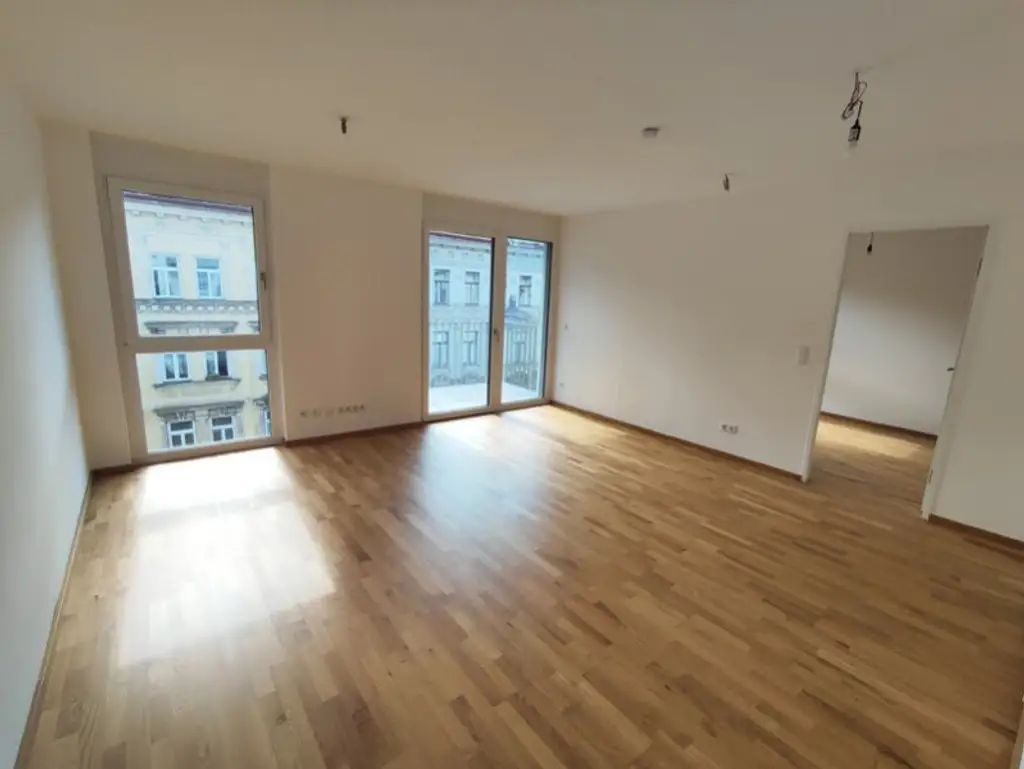 Modern wohnen in Meidling! Neubau 2-Zimmer-Erstbezug mit Balkon im 4. Liftstock - Top50
