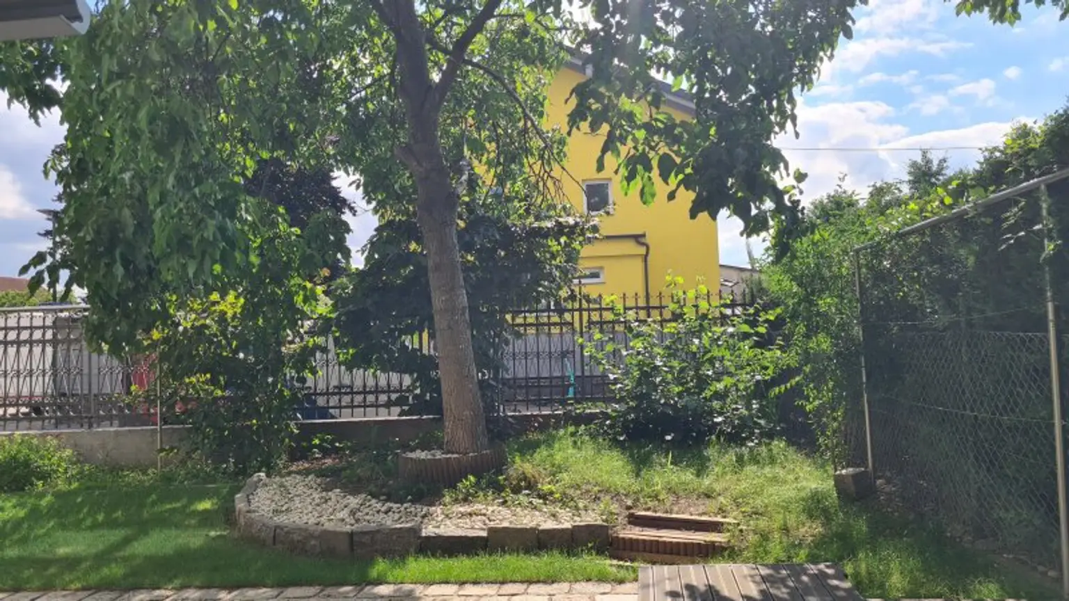 Sehr ruhige Siedlungslage - Gartenwohnung mit Garage in sehr gepflegten Haus