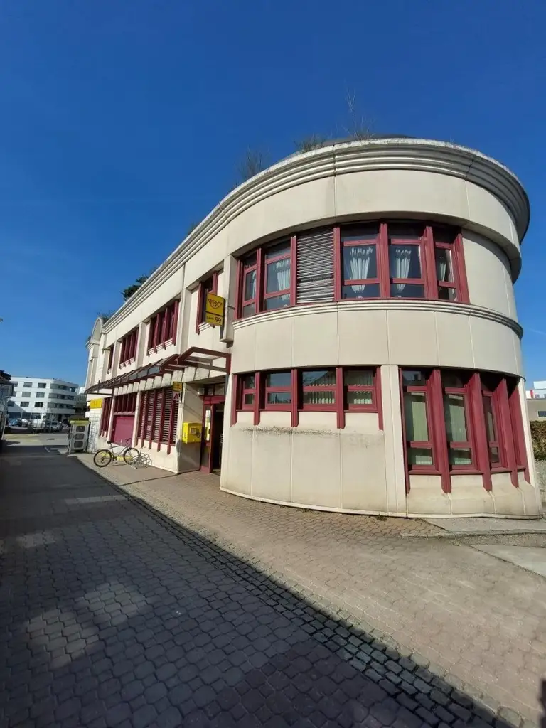 Geschäfts- Büro- und Wohnhaus