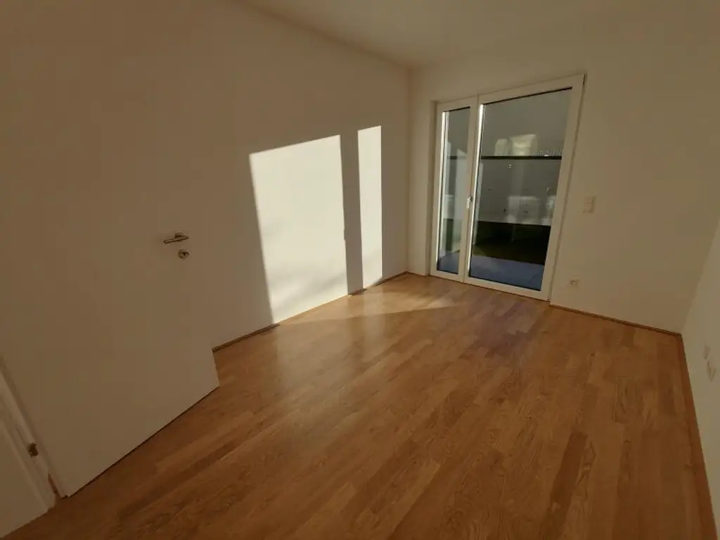 3-Zimmer-Erdgeschoßwohnung mit Terrasse und Tiefgaragenstellplatz (Top 02)