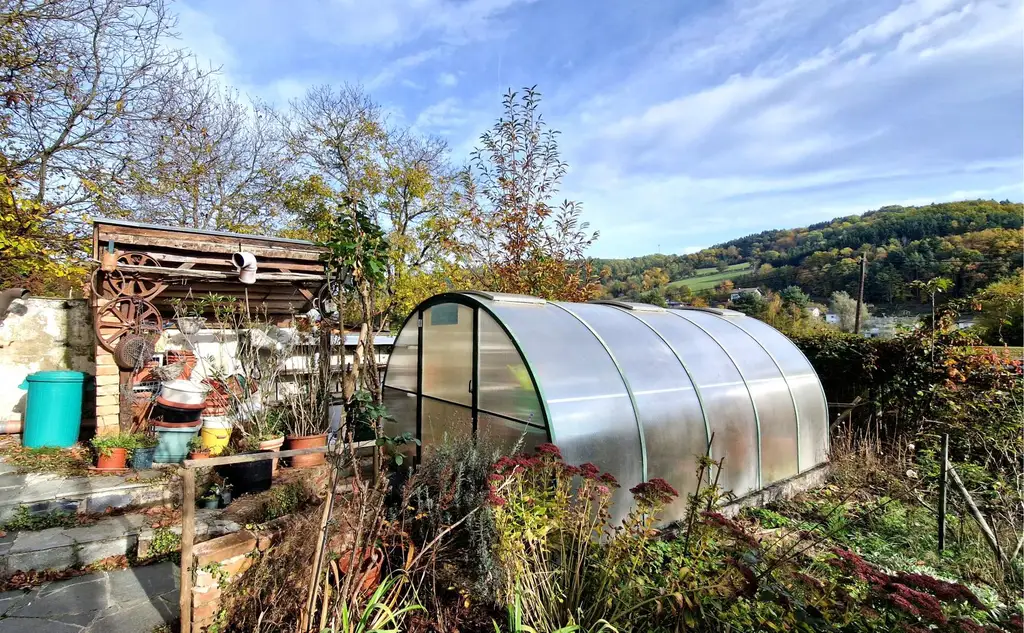 Entzückendes Einfamilienhaus mit Gartenoase in sonniger Lage