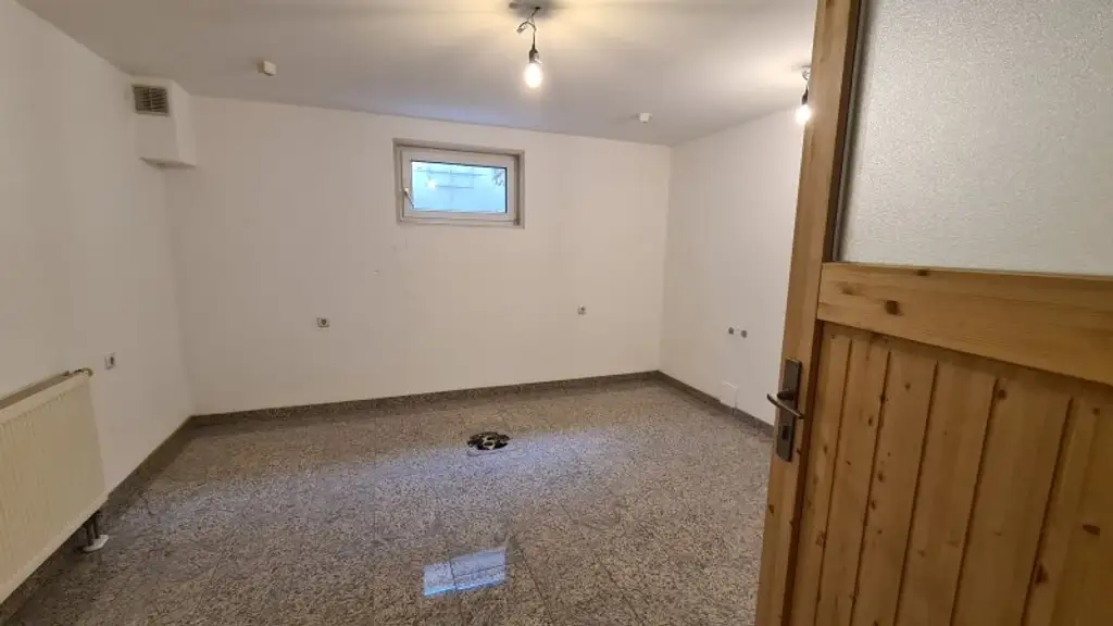 Sehr ruhige Siedlungslage - Gartenwohnung mit Garage in sehr gepflegten Haus