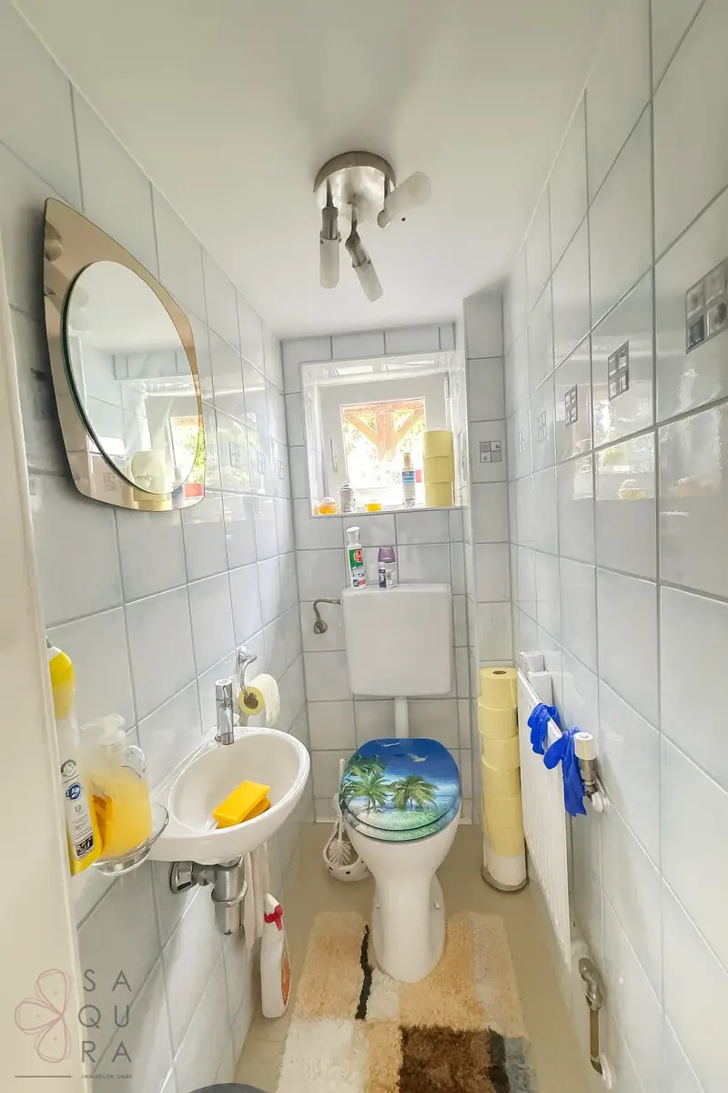 Charmantes Einfamilienhaus mit Einliegerwohnung, Garten und Garage – vielseitig nutzbar