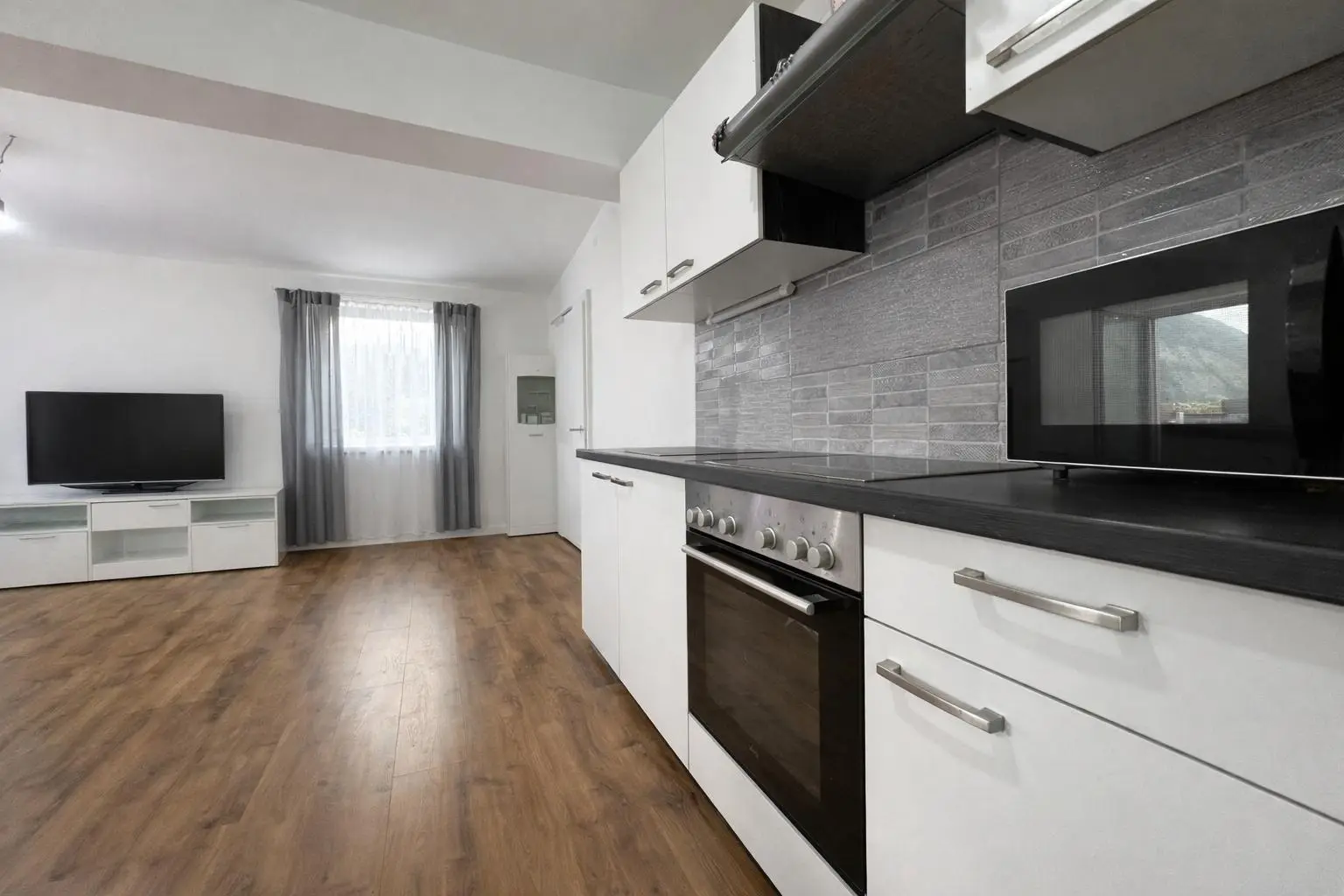 Wohnung - Wohn-, Koch- und Essbereich